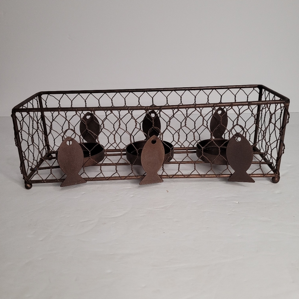 Rectangular wire basket with three candle holder.  282